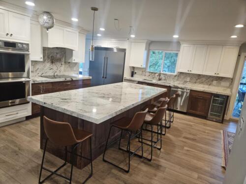 "Alpinus" Granite from Francinis Marble in Salt Lake Kitchen with full backsplash